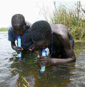 LifeStraw UF water purifier being used by children to drink river water